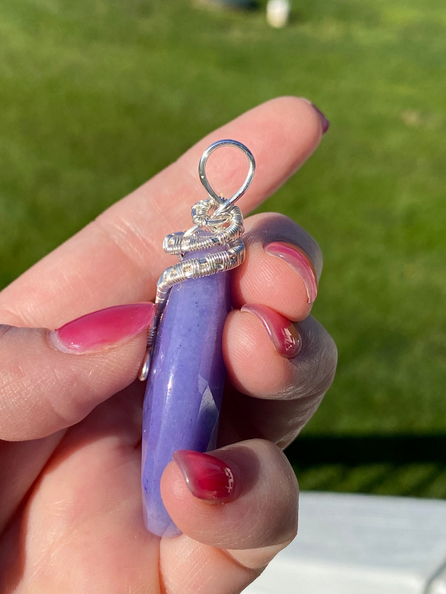 Blue calcite pendant with wire weave