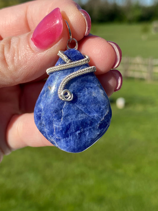 Sodalite pendant with wire weave nail