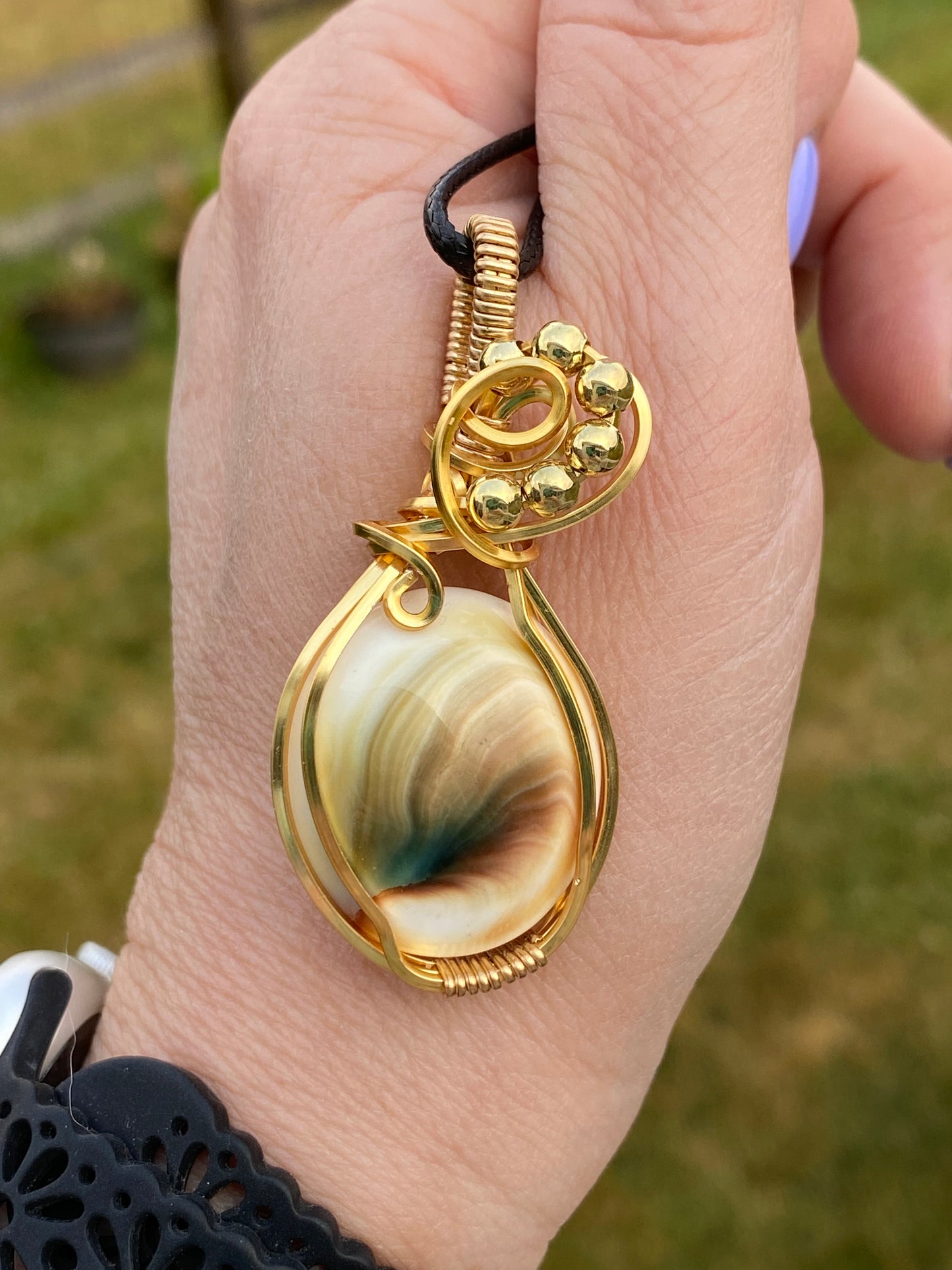 Eye Shell Wrapped in Square Gold