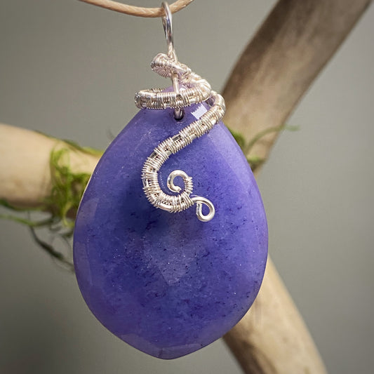 Blue calcite pendant with wire weave