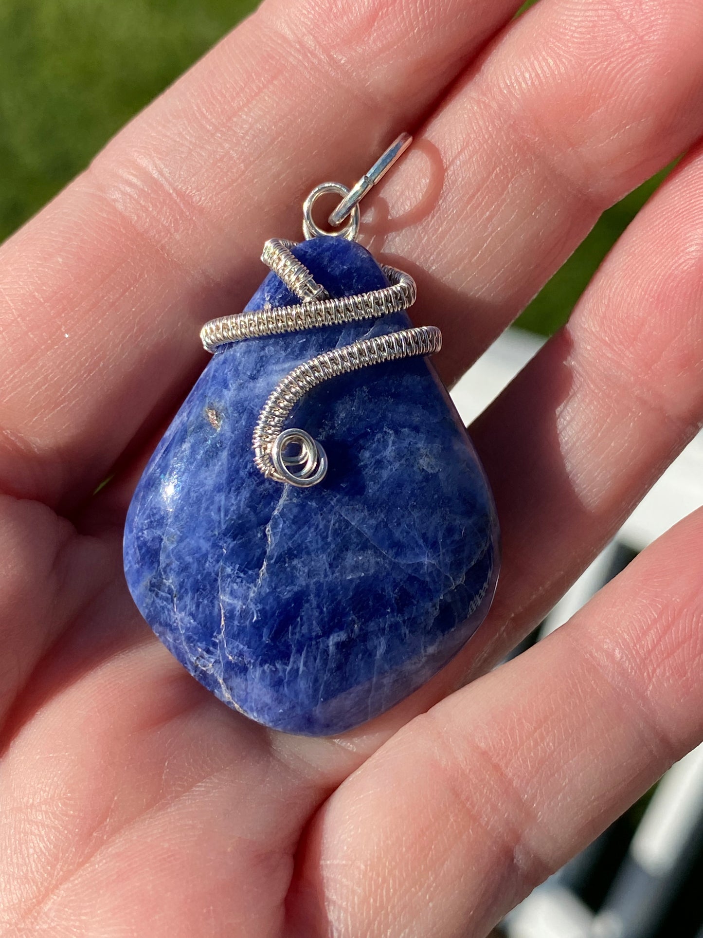 Sodalite pendant with wire weave nail