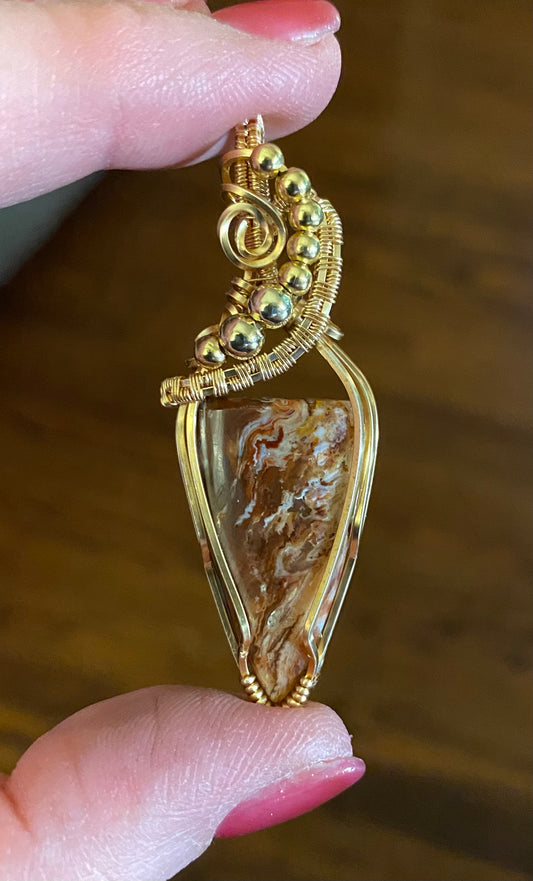 Stick Agate pendant in Gold Tone Wire